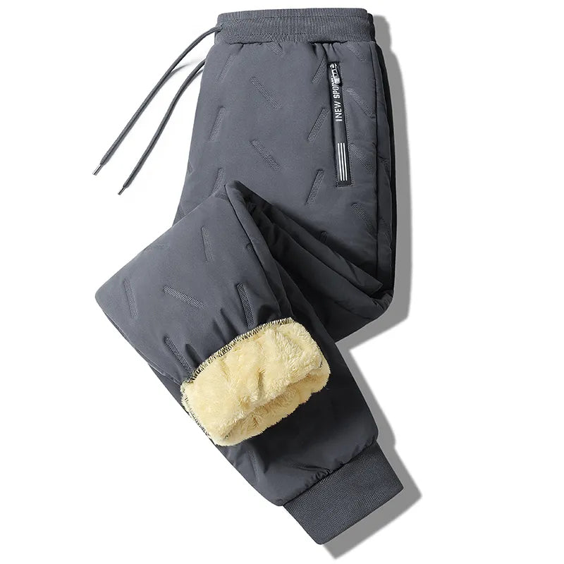 Sportinės UNISEX kelnės atsparios vėjui ir šalčiui